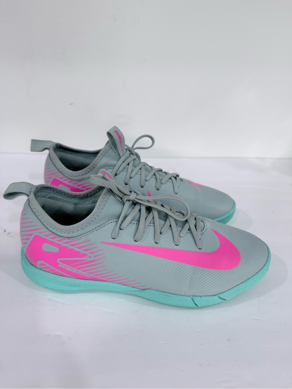 Kids Grey Athletic Shoes with Pink Swoosh and Teal Sole
